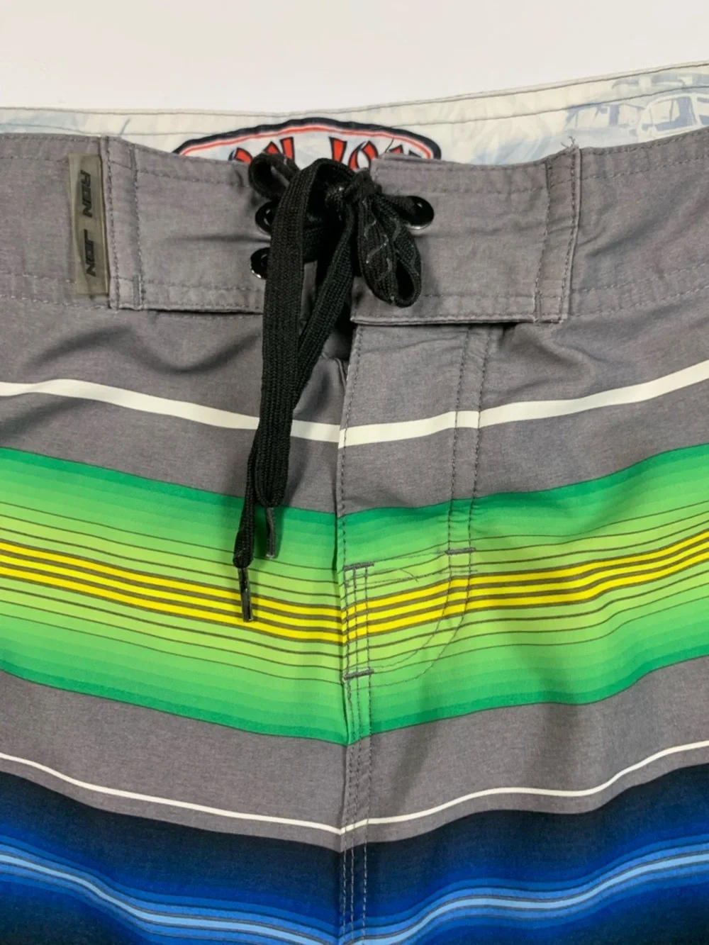 Ron Jon White Board Shorts with Orange & Black Logo